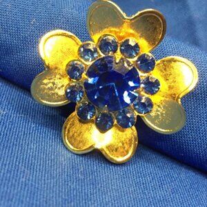 Antique Gold Flower Brooch with Blue Gems and Embossed Leaves